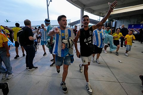 Argentina fans try to enter the stadium